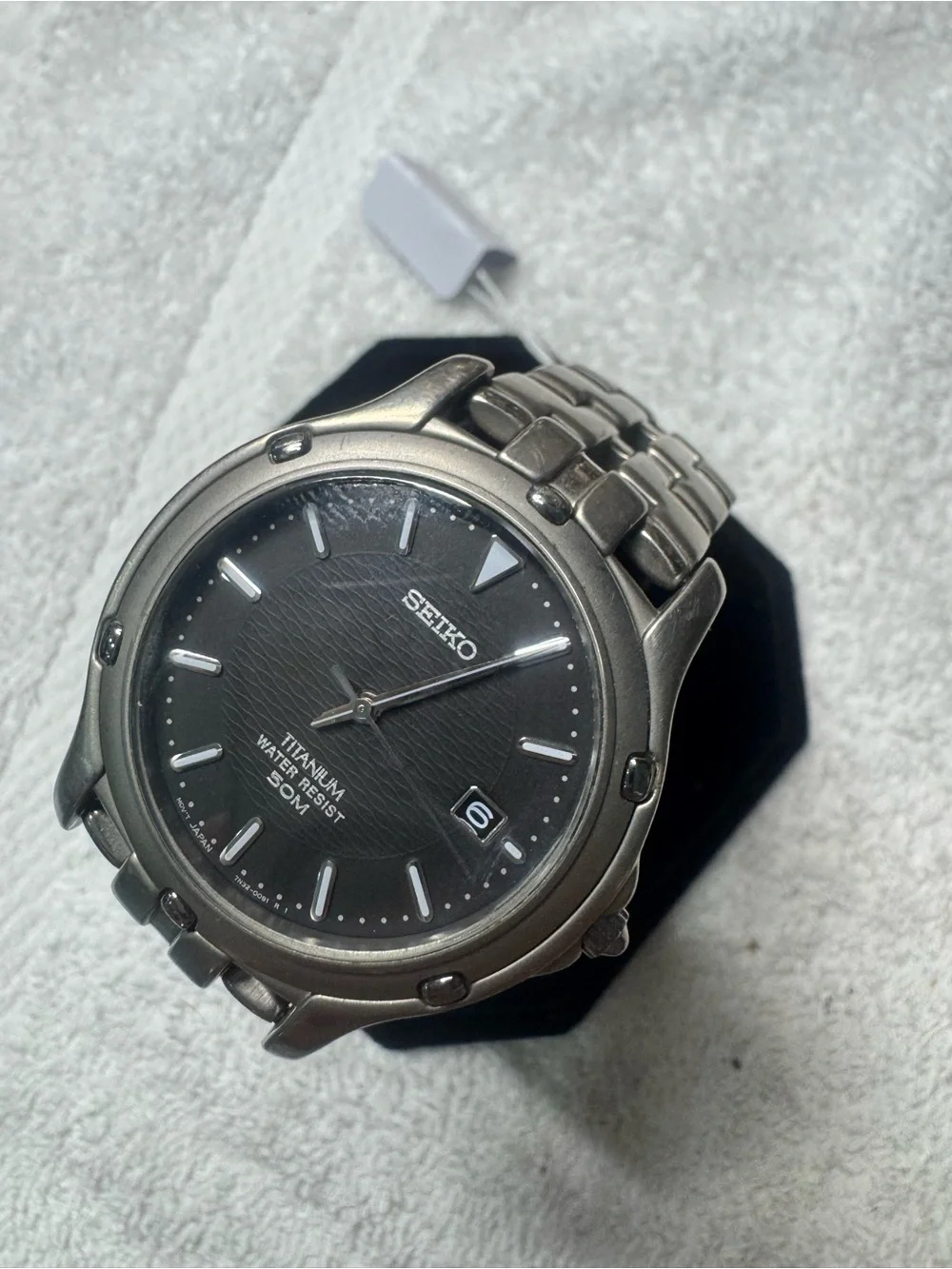 Seiko Titanium Watch with Black Dial and Silver Accents